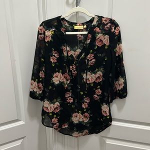 Black floral blouse